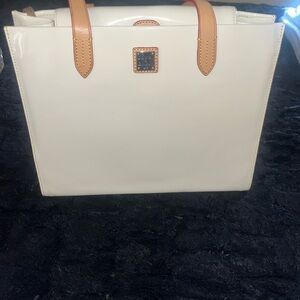 New Cream color Dooney& Bourke handbag 10H x 15W